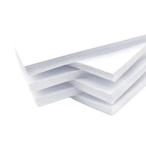 A stacked pile of high-whiteness premium 80gsm A4 copy paper reams for high-speed office printing and copying.